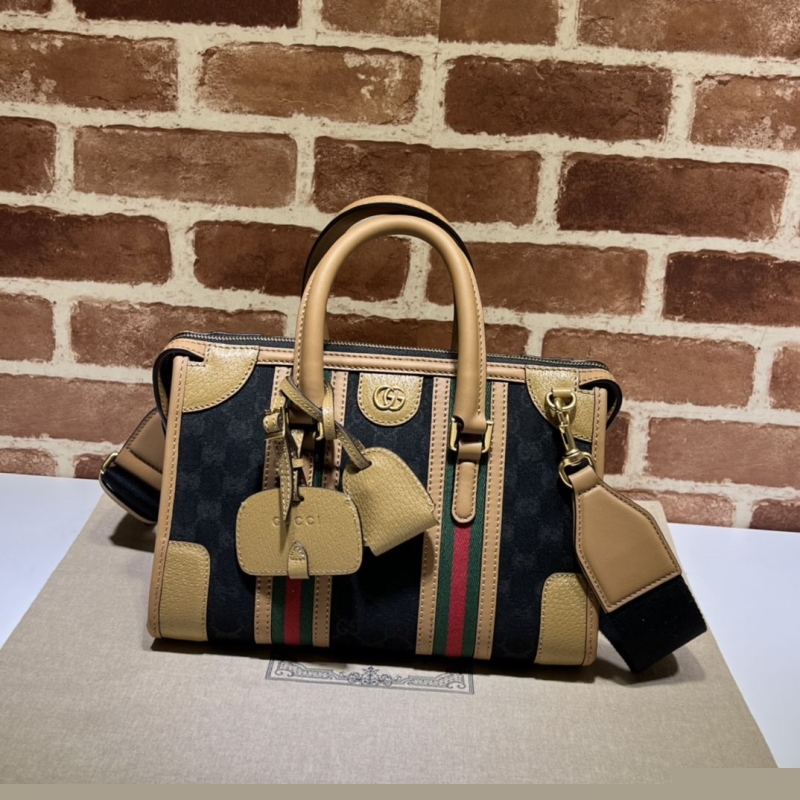 G*u*i shopping bags